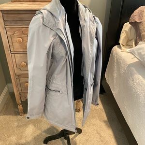 Women’s Natural Reflections brand rain coat, size large